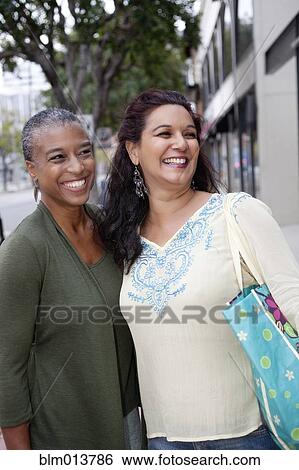 Smiling friends View Large Photo Image Stock Photograph - Smiling friends. Fotosearch