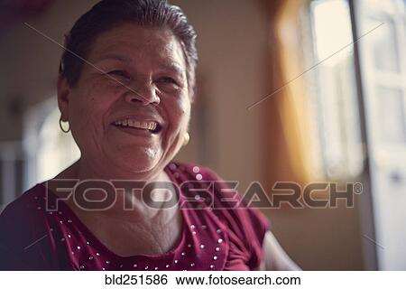 Smiling Hispanic woman View Large Photo Image Stock Photograph - Smiling Hispanic woman. Fotosearch