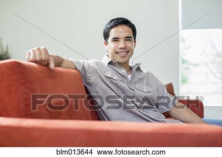 Picture - Smiling mixed race man. Fotosearch