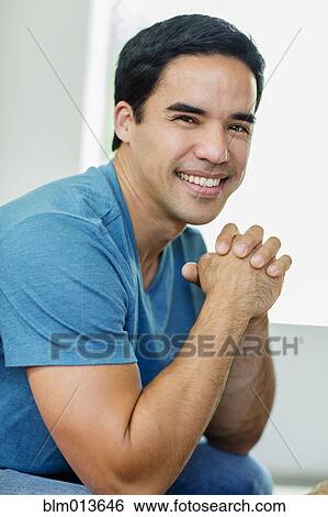 Smiling mixed race man View Large Photo Image Stock Photograph - Smiling mixed race man. Fotosearch