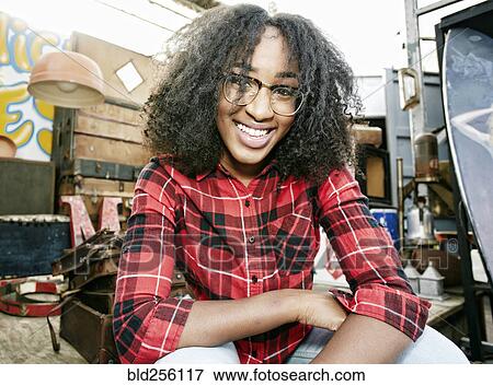 Stock Photo - Smiling mixed race woman. Fotosearch
