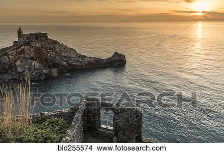 Stone building near ocean at sunset View Large Photo Image Picture - Stone building near ocean at sunset. Fotosearch