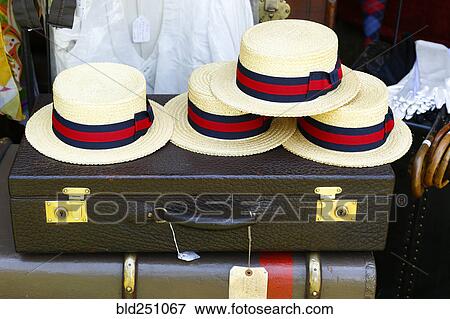 Straw hats on old-fashioned briefcase View Large Photo Image Stock Photo - Straw hats on old-fashioned briefcase. Fotosearch