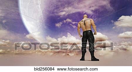 Picture - Strong man with tattoo on back standing in clouds. Fotosearch