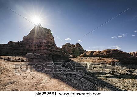 Stock Image - "Sun over desert in Moab, Utah, United States". Fotosearch