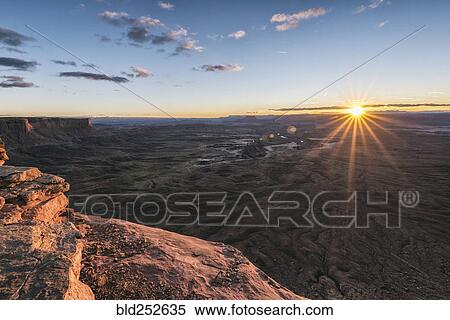 Stock Photography - "Sunset in canyon, Moab, Utah, United States". Fotosearch