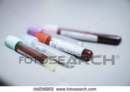 Test tubes with caps on table View Large Photo Image Stock Image - Test tubes with caps on table. Fotosearch