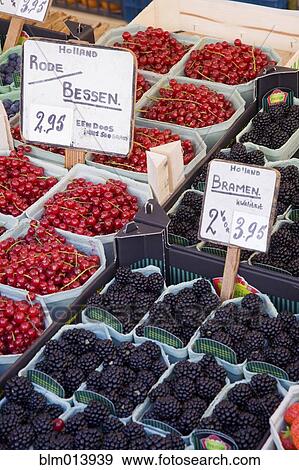 Stock Photo - Variety of fruit for sale in market. Fotosearch