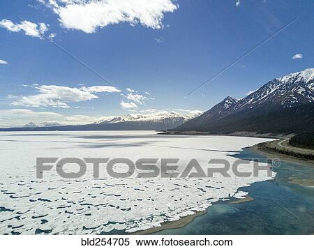Stock Photography - Waves on beach. Fotosearch