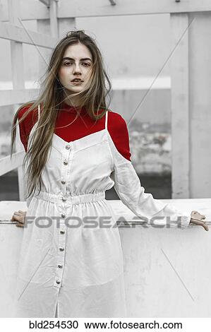 Stock Image - Wind blowing hair of Caucasian woman. Fotosearch