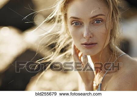 Wind blowing hair of Caucasian woman View Large Photo Image Stock Photo - Wind blowing hair of Caucasian woman. Fotosearch