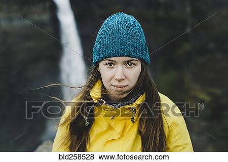 Wind blowing hair of Caucasian woman near waterfall View Large Photo Image Stock Photo - Wind blowing hair of Caucasian woman near waterfall. Fotosearch
