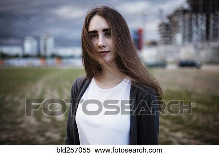 Stock Photography - Wind blowing hair of Caucasian woman. Fotosearch