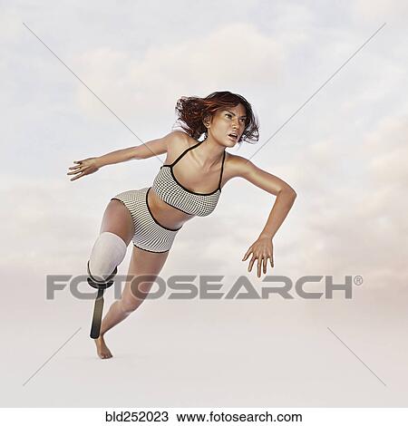 Woman running with artificial leg View Large Photo Image Stock Image - Woman running with artificial leg. Fotosearch