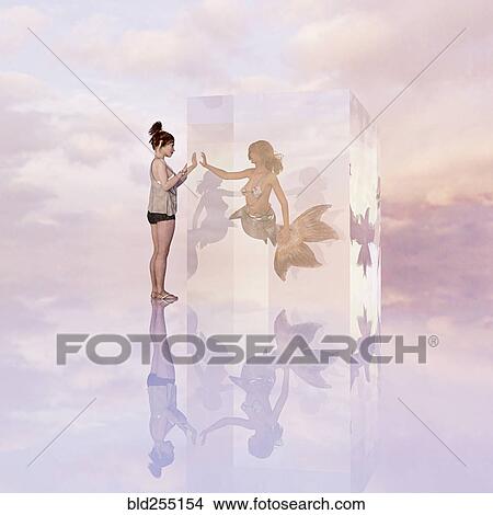 Picture - Woman standing near mermaid in cube. Fotosearch
