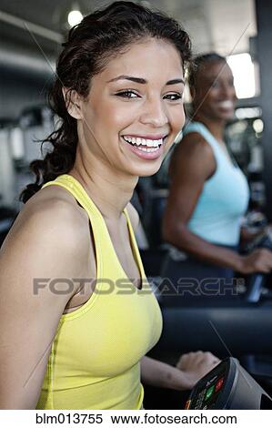 Women exercising in health club View Large Photo Image Stock Photography - Women exercising in health club. Fotosearch
