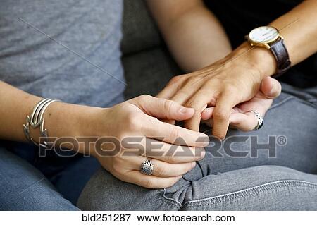 Women holding hands View Large Photo Image Stock Photo - Women holding hands. Fotosearch
