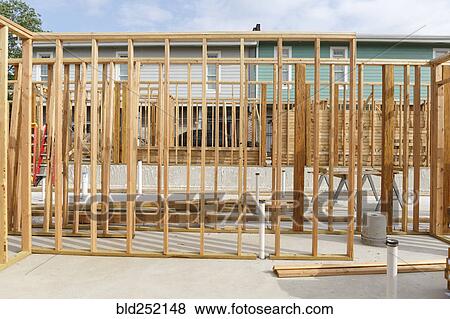 Stock Photo - Wooden frame on construction site. Fotosearch