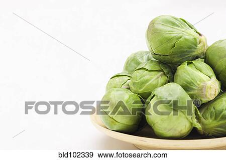 Brussels sprouts on plate View Large Photo Image Stock Photo - Brussels sprouts on plate. Fotosearch