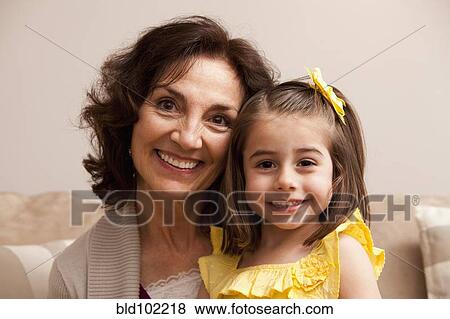 Stock Photo - Caucasian grandmother and granddaughter. Fotosearch
