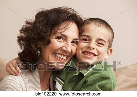 Caucasian grandmother hugging grandson View Large Photo Image Stock Image - Caucasian grandmother hugging grandson. Fotosearch