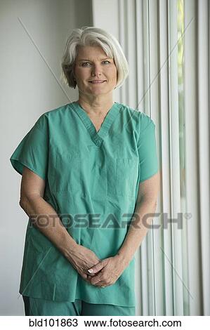Caucasian surgeon in scrubs View Large Photo Image Stock Image - Caucasian surgeon in scrubs. Fotosearch
