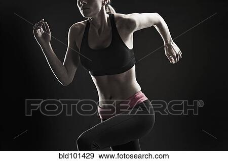 Stock Photo - Caucasian woman running. Fotosearch