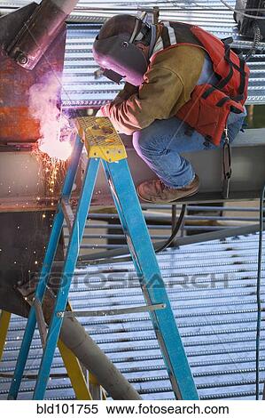 Construction worker welding metal View Large Photo Image Stock Photography - Construction worker welding metal. Fotosearch