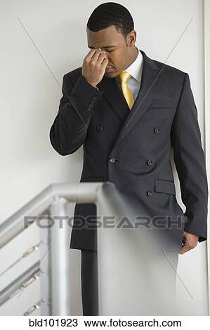Frustrated mixed race businessman View Large Photo Image Stock Image - Frustrated mixed race businessman. Fotosearch