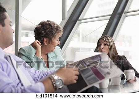 Hispanic business people on break together View Large Photo Image Picture - Hispanic business people on break together. Fotosearch