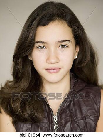 Picture - Serious Hispanic girl. Fotosearch