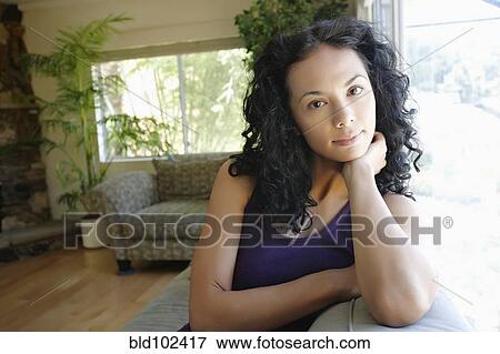 Stock Photo - Serious Hispanic woman. Fotosearch