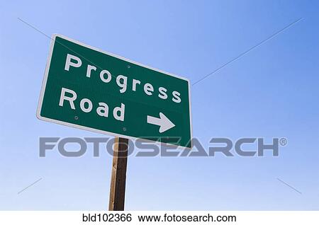 Sign with arrow toward Progress Road View Large Photo Image Stock Photograph - Sign with arrow toward Progress Road. Fotosearch