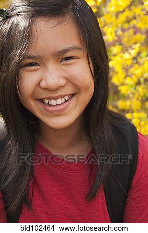 Picture - Smiling Asian girl. Fotosearch