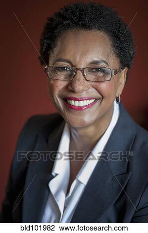 Stock Image - Smiling Black businesswoman. Fotosearch