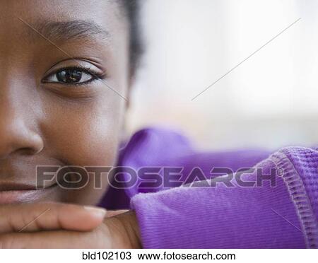 Stock Image - Smiling Black girl. Fotosearch