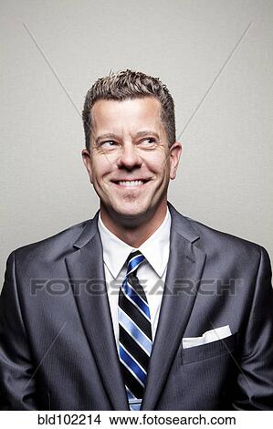 Picture - Smiling Caucasian businessman. Fotosearch