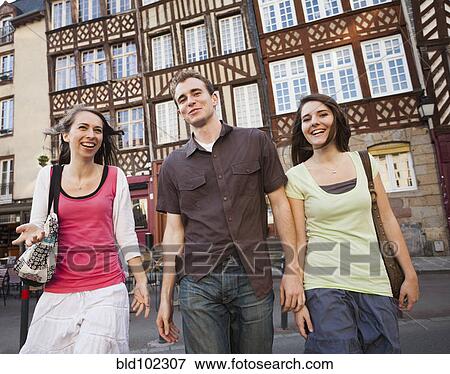 Stock Photo - Smiling Caucasian friends. Fotosearch