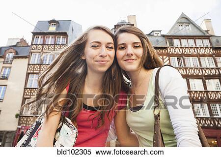 Stock Photography - Smiling Caucasian friends. Fotosearch