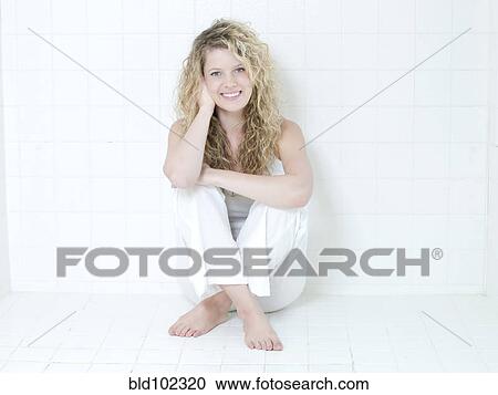 Stock Image - Smiling Caucasian woman. Fotosearch