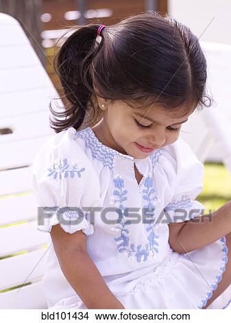 Picture - Smiling Hispanic girl. Fotosearch
