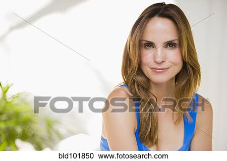 Stock Image - Smiling Hispanic woman. Fotosearch