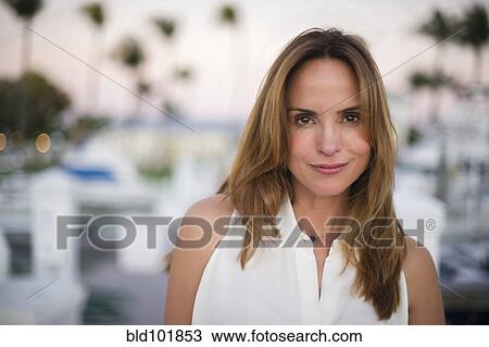Stock Image - Smiling Hispanic woman. Fotosearch