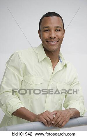 Smiling mixed race man View Large Photo Image Stock Image - Smiling mixed race man. Fotosearch