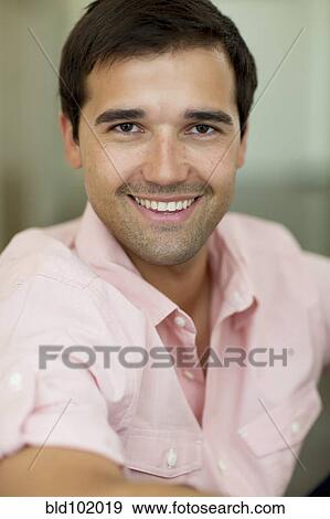Stock Photo - Smiling mixed race man. Fotosearch