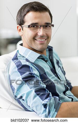Stock Photo - Smiling mixed race man. Fotosearch