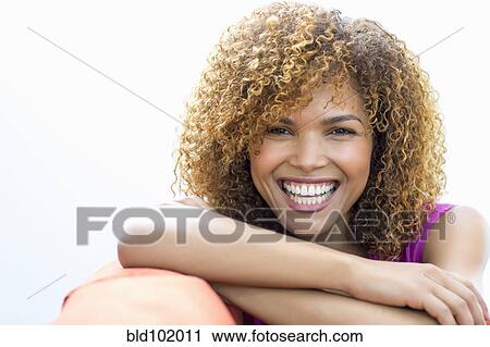 Smiling mixed race woman View Large Photo Image Stock Image - Smiling mixed race woman. Fotosearch