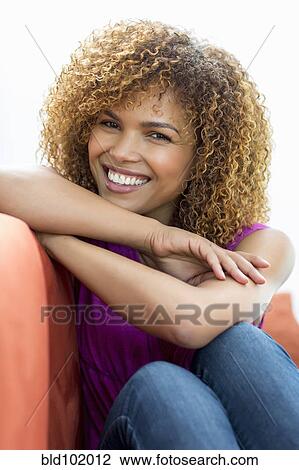 Smiling mixed race woman View Large Photo Image Stock Image - Smiling mixed race woman. Fotosearch