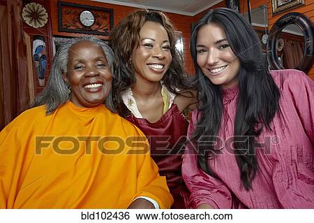 Stock Photograph - Women having hair done in beauty salon. Fotosearch