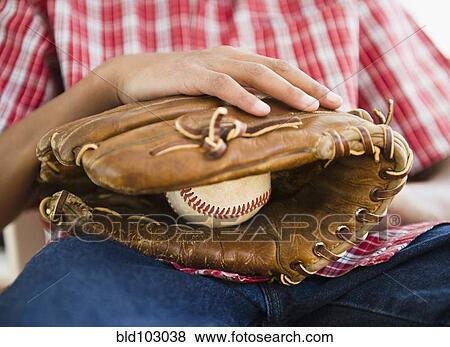 African American boy holding baseball and glove View Large Photo Image Stock Photo - African American boy holding baseball and glove. Fotosearch